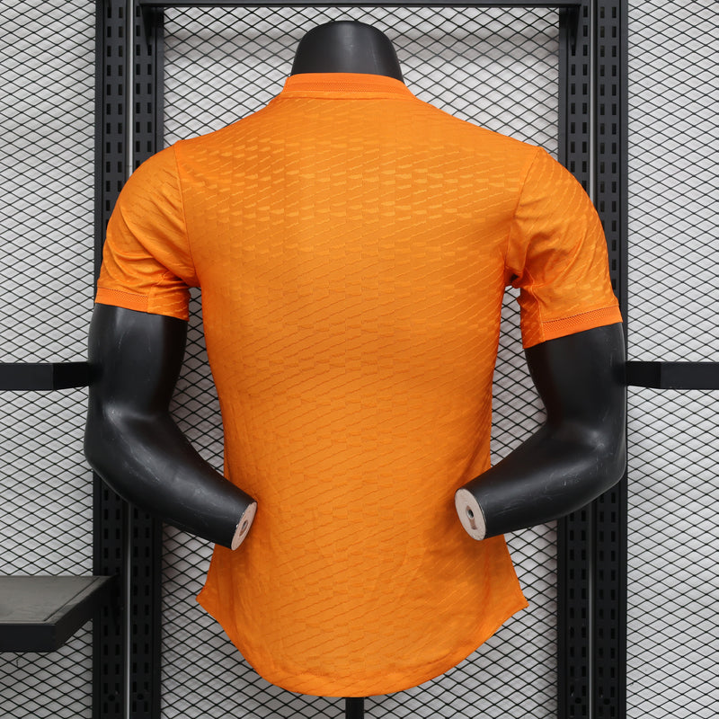 Camisa Real Madrid Laranja IIII 2024 - Versão Jogador Masculina